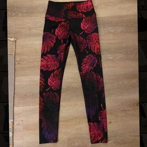 Black leggings with red leaves
